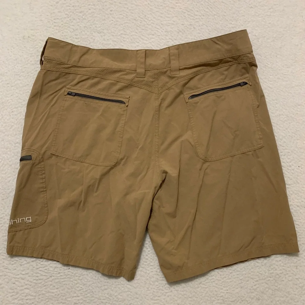 Huk Performance Fishing Shorts Mens XXL 42x10 Quick Dry Stretch Cargo Pocket Tan